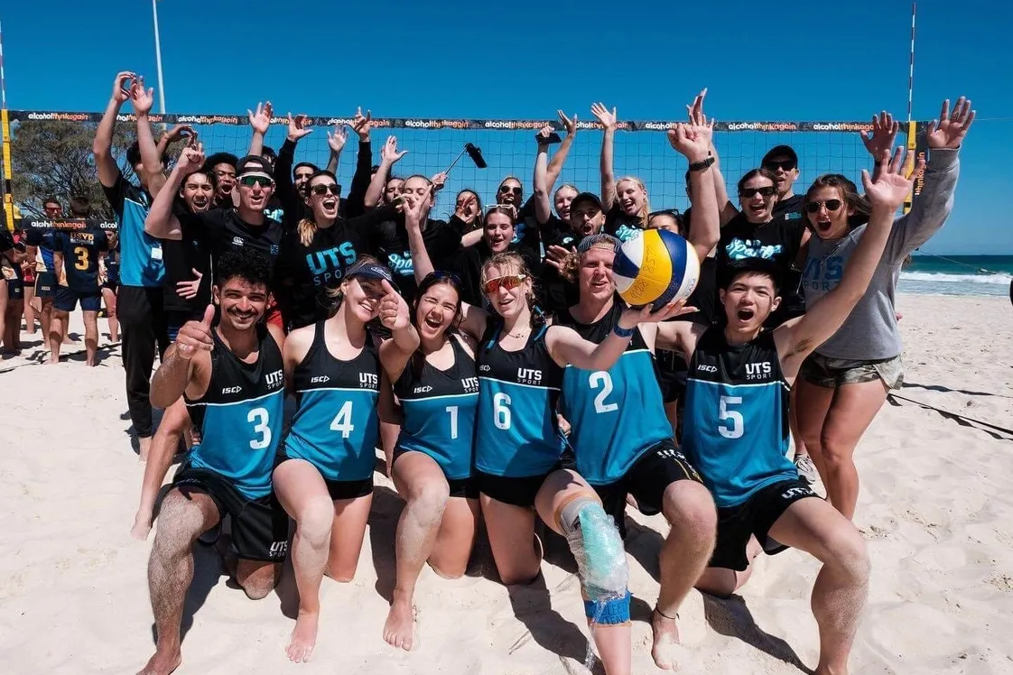 UTS Volleyball members playing beach volleyball